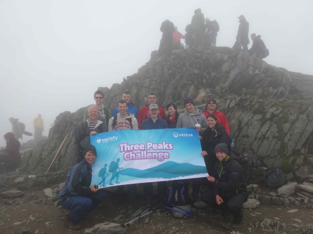The Veolia team stand atop Snowdon's summit